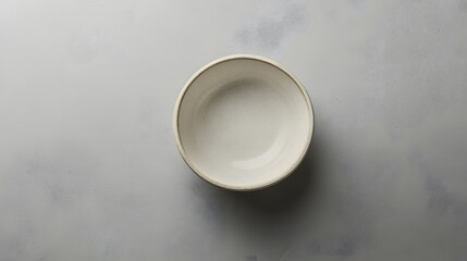 Empty Oval Ceramic Bowl on Gray Surface