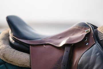 a leather saddle for a horse. an old Turkish horse saddle