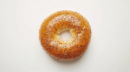 A freshly baked bagel with a golden brown crust and sprinkled with poppy seeds rests against a clean white background. Ideal for breakfast or a snack