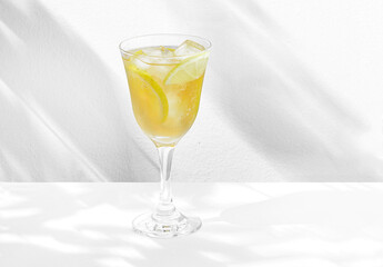 limoncello spritz in a glass on the table with lemons