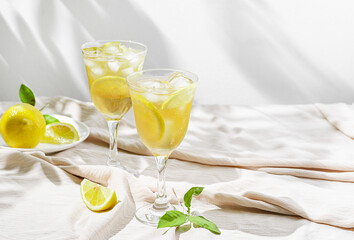 limoncello spritz in a glass on the table with lemons