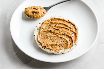 peanut paste with chia on rice bread