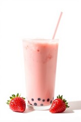 there is a glass of milk with strawberries on the side