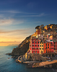 Wonderful sunset over Riomaggiore fishing village. Cinque Terre, Italy