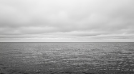 Serene seascape with overcast sky reflecting tranquility in northern natural environment