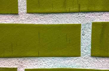 wall of a house with bricks and stains of rain drops