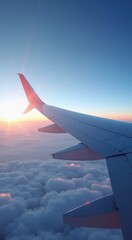 Obraz premium Arafed view of a wing of an airplane flying above the clouds