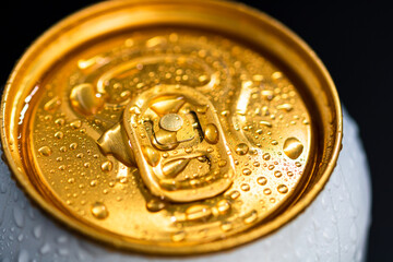 Top of beer can with condensation water droplets isolated.
