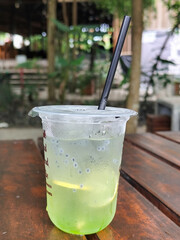 Melon Squash is made from soda water, melon syrup, mint leaves, and lemon slices in it. Very refreshing to drink when thirsty.