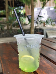 Melon Squash is made from soda water, melon syrup, mint leaves, and lemon slices in it. Very refreshing to drink when thirsty.