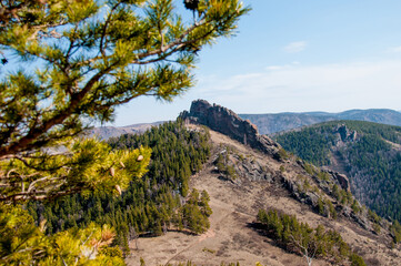 Landscape of snowy mountains, mountain range in haze summer