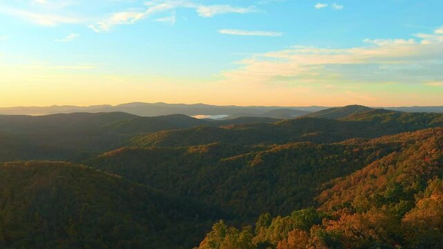 Aerial view of autumn colors at sunrise in the Blue Ridge Mountains of North Carolina.