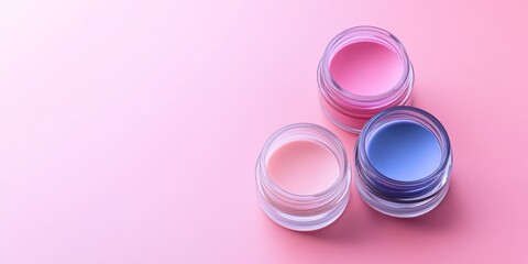 Cosmetic jars on a solid background with open space for a tagline or slogan.