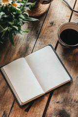 Fototapeta premium A notebook is open on a wooden table with a cup of coffee next to it. The notebook is empty, and the coffee cup is full. The scene suggests a moment of relaxation or contemplation