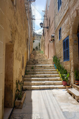 Steps up a narrow street in the old, traditional town
