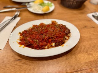 Turkish Halep kebap with bread, in Turkey.