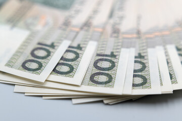 One hundred Polish zlotys, banknotes. Business and money.
