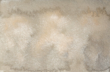 Grain wet watercolor paper texture blot painting wall. Abstract nacre silver, gold, beige marble copy space background.