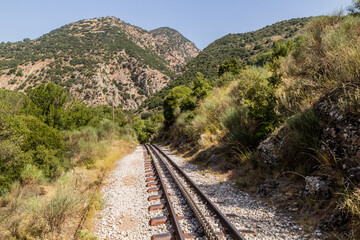 Narrow gauge cogwheel Odontotos railway in Vouraikos Gorge on Peloponnese peninsula, Greece.