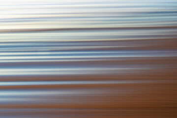 Sea surface abstract in soft tones and horizontal blurred lines