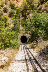 Narrow gauge cogwheel Odontotos railway in Vouraikos Gorge on Peloponnese peninsula, Greece.
