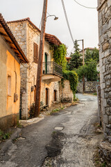 Fototapeta premium Alley in Vytina village on Peloponnese peninsula, Greece