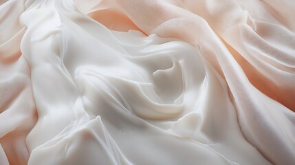 Obraz premium Creamy white lotion on peach colored fabric