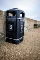 Litter bin by the coast