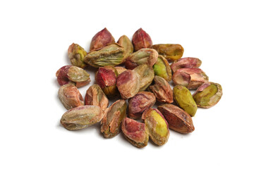 peeled pistachios on a white background