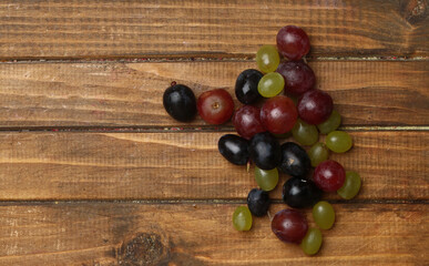 bunch of grapes on a rustic background