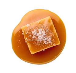 salted caramel candy in melted caramel sauce isolated on white background, top view