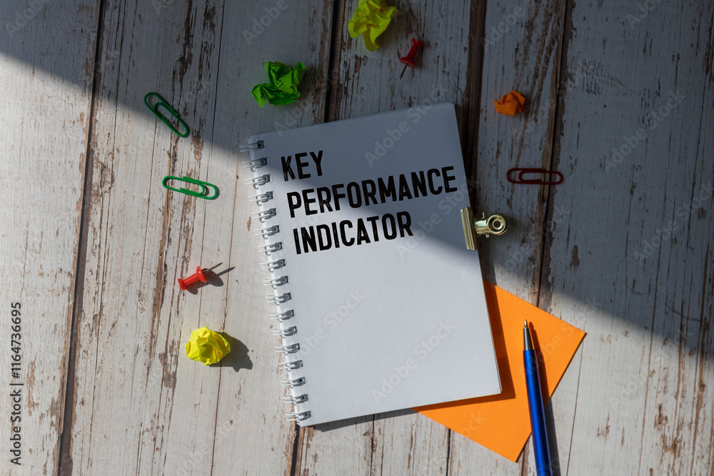 Poster key performance indicator (kpi) text on notepad