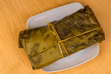 Colombian tamale recipe with steamed banana leaves