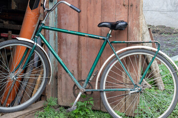 old bicycle saddle frame trunk close-up