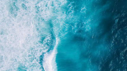 Obraz premium Beautiful aerial view of ocean waves with white foam in the turquoise sea, flat lay