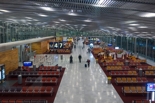 Departure gates at Charles de Gaulle Airport in Paris, France.