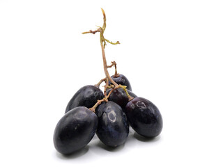 Autumn Royal grapes or seedless black grapes variety isolated on a clean white background