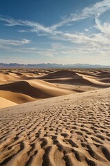 A vast desert with rolling sand dunes under a clear blue sky. Warm tones and minimalism evoke feelings of adventure and tranquility.
