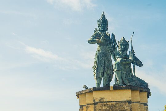 Nusa Dua beach with Arjuna and Kresa statue in Nusa Dua Peninsula park, Bali, Indonesia 