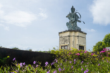 Nusa Dua beach with Arjuna and Kresa statue in Nusa Dua Peninsula park, Bali, Indonesia 