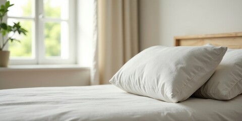 A serene bedroom scene featuring a neatly made bed with soft, plush pillows resting against a light wooden headboard, bathed in the soft glow of natural sunlight streaming through a nearby window.