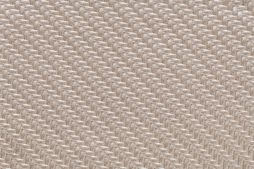 Quilted fabric texture with a diamond pattern in beige color, featuring a subtle sheen and woven appearance, creating a luxurious, elegant look