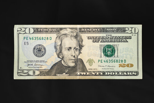 The front of a twenty dollar bill