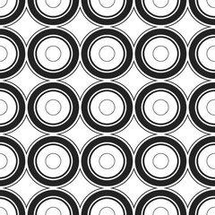 A repeating pattern of concentric circles in black and white, suitable for graphic design.