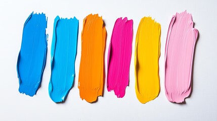 Naklejka premium A vibrant array of colorful paint strokes, showcasing blue, orange, pink, yellow, and more, perfect for artistic inspiration.