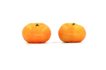 Close up of fresh orange fruit on gray background, selective focus and blank space concept.