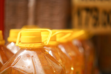 yellow sunflower oil bottle lined up in a store 