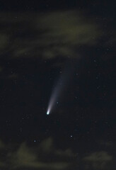 Comet shoots through clouds