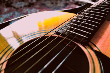 close-up of acoustic wooden guitar with five strings music classic bluegrass country folk musical...