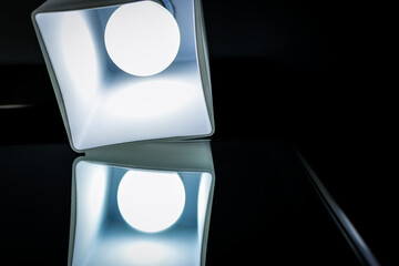 close-up of a dim warm wall lamp light lights for interior home decor glowing illuminated contrast...